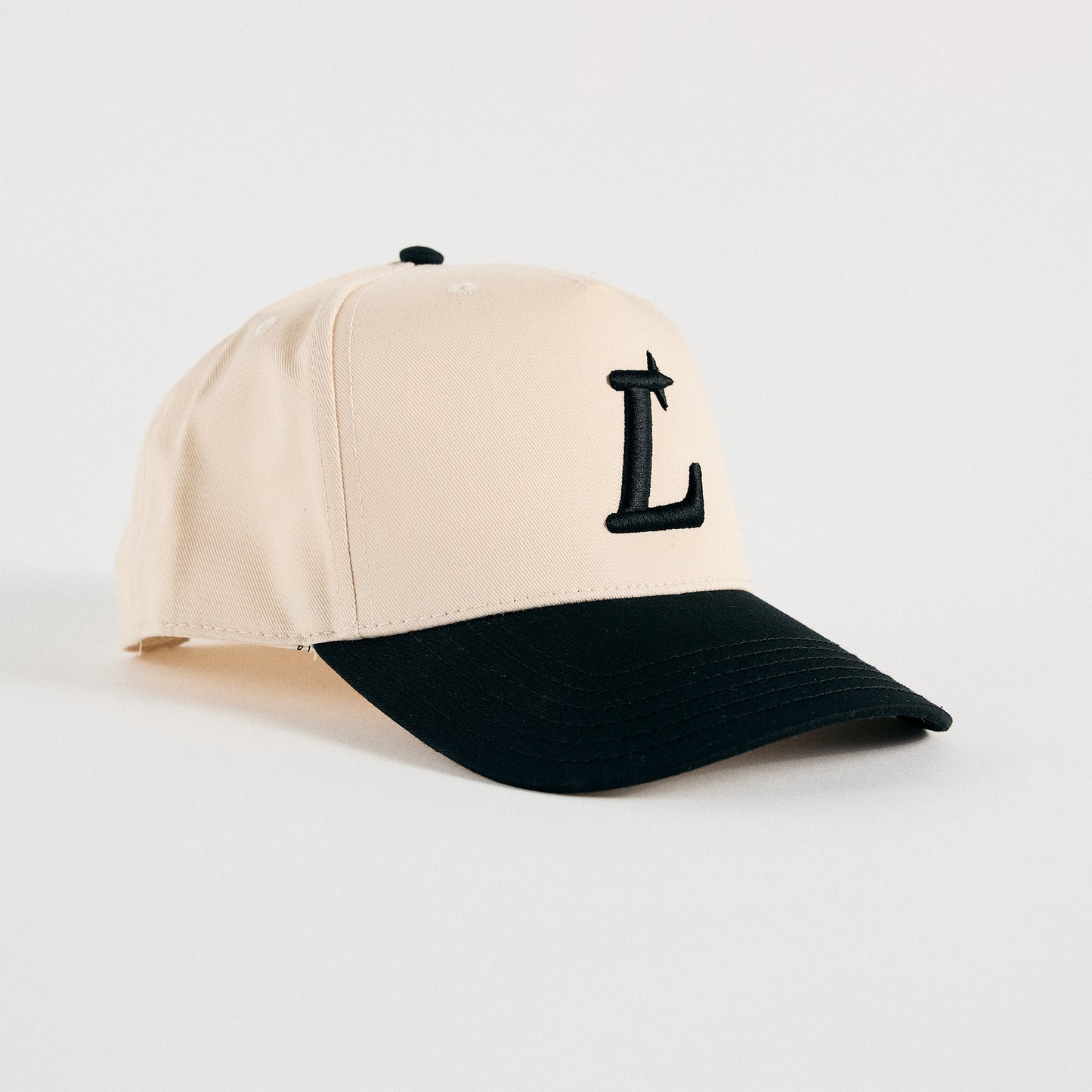 L STAR SNAPBACK- CREAM & BLACK