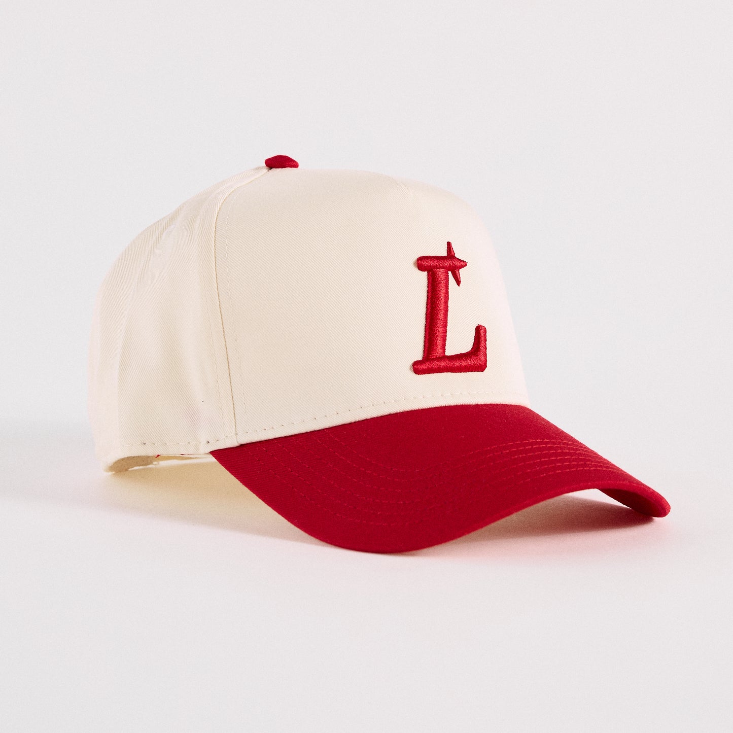 L STAR SNAPBACK- CREAM & RED